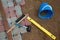 Stone blocks rubber hammer level and tape measure