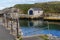 The stone boathouse in the harbor at Ballintoy on the North Coast of Antrim in Ireland