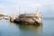 Stone breakwater barge and ocean view from the backyard of Vizcaya Museum in Miami