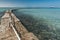 Stone breakwater in the sea