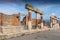 Stone and brick columns in The Forum in the archaeological excavations of Roman Pompeii near Naples, Campania, Italy