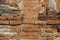 Stone brick Wall in the middle of clay, layered stack decoration, sunlight outdoor retro style, backgrounds