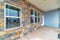 Stone brick wall windows and front door at the facade of a residential house