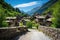 stone bridge leading to a classic mountain village