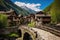 stone bridge leading to a classic mountain village