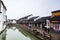 Stone bridge and old buildings in Zhujiajiao, an ancient water town in Shanghai, best known for its bridges, built during Ming and