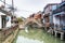 Stone bridge and old buildings in Zhujiajiao, an ancient water town in Shanghai, best known for its bridges, built during Ming and