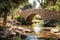 Stone bridge over a calm river stream in the park