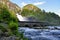 Stone bridge over Latefossen waterfalls in Norway