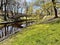 Stone bridge over Riga river canal in Bastion park early spring time