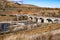 Stone bridge over a river and crossroads