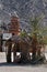 Stone buildings and artificially grown date palms in the village of local residents of the Arabian desert, Egypt.