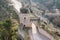 Stone-built, gated entrance in the historic city walls of Alarcon, Spain