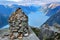 Stone cairn on Neverdalsfjell mountain over Lysefjord and Preikestolen rock, Norway