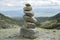 Stone cairn pyramid, valley in High Tatras, Mlynska Dolina, wild slovakia mountains