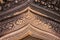 Stone carved bas-relief of Banteay Srei temple, Angkor Wat, Cambodia. Traditional floral bas-relief on cambodian temple