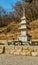 Stone carved Buddhist four story pagoda