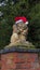 Stone carved creature with a Christmas hat found in Stratford-upon-Avon, UK