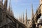 Stone-carved lace of sculptures and spires of the Cathedral, Milan, Italy