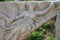 Stone carving of the goddess Nike at the ruins of ancient Ephesus, Turkey