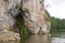 Stone with a cave on the river, Sverdlovsk area