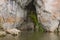 Stone with a cave on the river, Sverdlovsk area