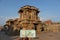 Stone chariot back drop with fifty rupees note, Vittala Temple, Hampi, Karnataka