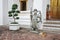 Stone Chinese Entrance Guardian of The Temple with Cat at Wat Pho, Bangkok Thailand