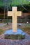 Stone christcross in the park of Jeoldusan Martyrs Shrine.