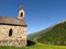 Stone church Alpine mountain valley spring summer