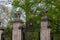 Stone column with eagle sculptures and wrought iron gate at the entrance to Princeton University