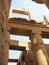 Stone columns and beams decorated with hieroglyphics in Egypt