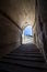 Stone corridor with stairway in Palazzo Pitti, Florence, Italy