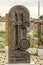 Stone cross carved with ornaments in the form of the eighth letter  of the Armenian alphabet, created by Mesrop Mashtots in the vi