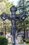Stone cross with a crist from a cementery