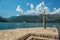 Stone cross on the island of St. Jerzego OstrÃ³w, Sveti Dorde. One of two islets near the coast of Perast in the Bay of Kotor.