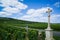 Stone cross marker in vineyard