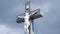 Stone cross at the old cemetery. Dark Gothic graveyard. Clouds over an abandoned cemetery. Old graves during the first