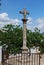 Stone cross outside the Marquis of Salvatierre House, Ronda, Spain.