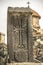 Stone cross seventh century at the entrance of the Church of Karmravor in the city of Ashtarak