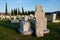 Stone cross and tombstones of medieval necropolis Radimlja