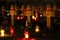 Stone crosses on the graves of unknown soldiers at night