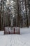 Stone crucifix in winter forest on Bily kriz in Moravskoslezske Beskydy mountains on czech - slovakian borders