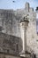 Stone decorations on the entrance ramp through the stone wall to the old town of Dubrovnik, Croatia