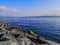 Stone embankment along Kennedy Avenue in Istanbul Turkey. Seascape with granite boulders on the shore against the background of