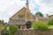 Stone english cottage in Cotswolds village