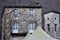 The stone facade of an old house, the bell tower of the church in the town of Isola Santa, magic in the heart of the Apuan Alps, i