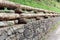 Stone fencing. combining stone and wood for the fence