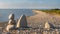 Stone figures on the beach of the Sorve Peninsula in the Ojessaare Nature . Estonia,