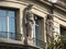 Stone figures on the facade of a house in Paris.